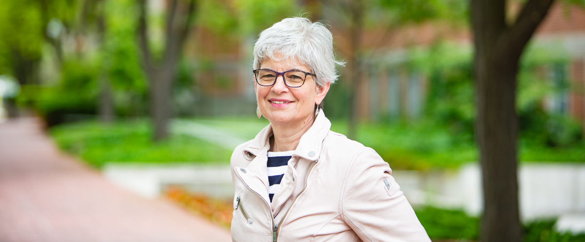 Portrait of Dr. Lynda Ashbourne on Reynolds Walk at UofG