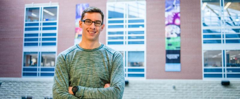 Portrait of graduate student David Duhan (MSc, Planning) in the Albert A. Thornbrough Building, University of Guelph