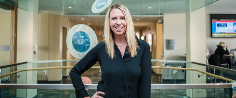 Portrait of graduate student Sarah Ranby (MSc, Family Relations and Human Development) in the atrium of Mac Donald Stewart Hall at the University of Guelph