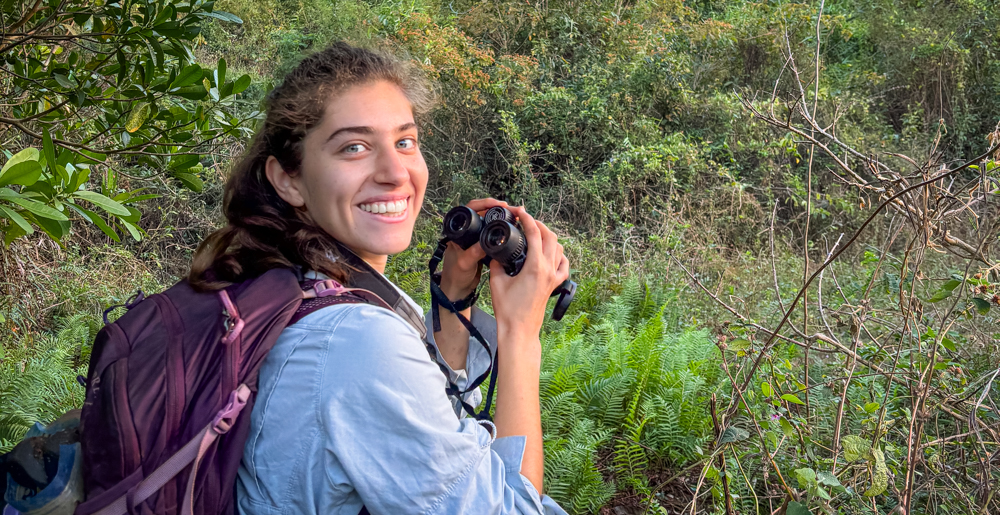Gabriella Salvadore with binoculars in Madagascar