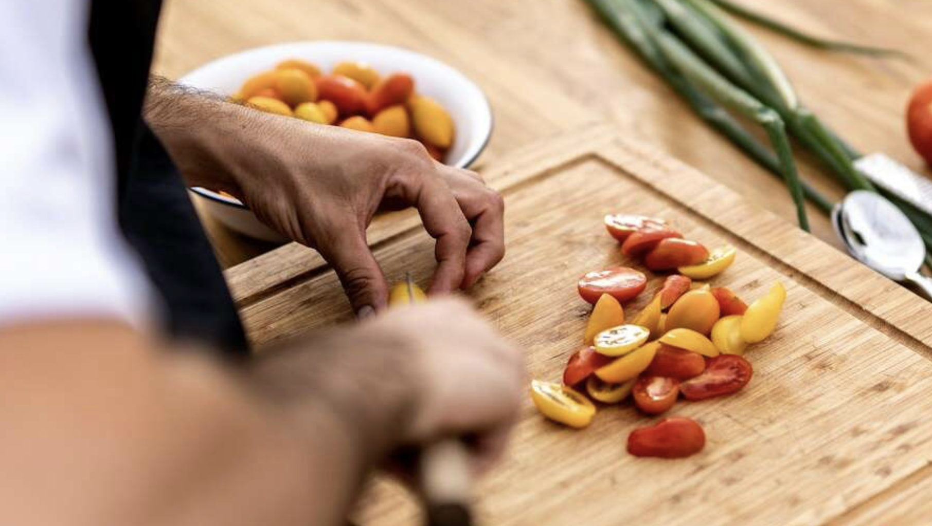 Close up of a person preparing vegetables