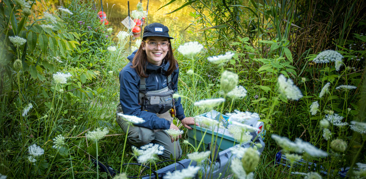 U of Guelph Environmental Sciences + Toxicology PhD candidate Moira Ijzerman at a river site