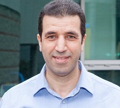 Headshot of Aziz Houmam