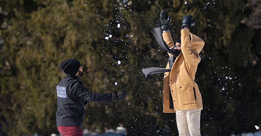 Students in snow on Johnston Green