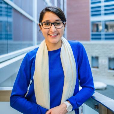 Portrait of graduate student Sidra Sarfaraz (MSc, Human Health & Nutrtional Sciences) in theScience Atrium at the University of Guelph
